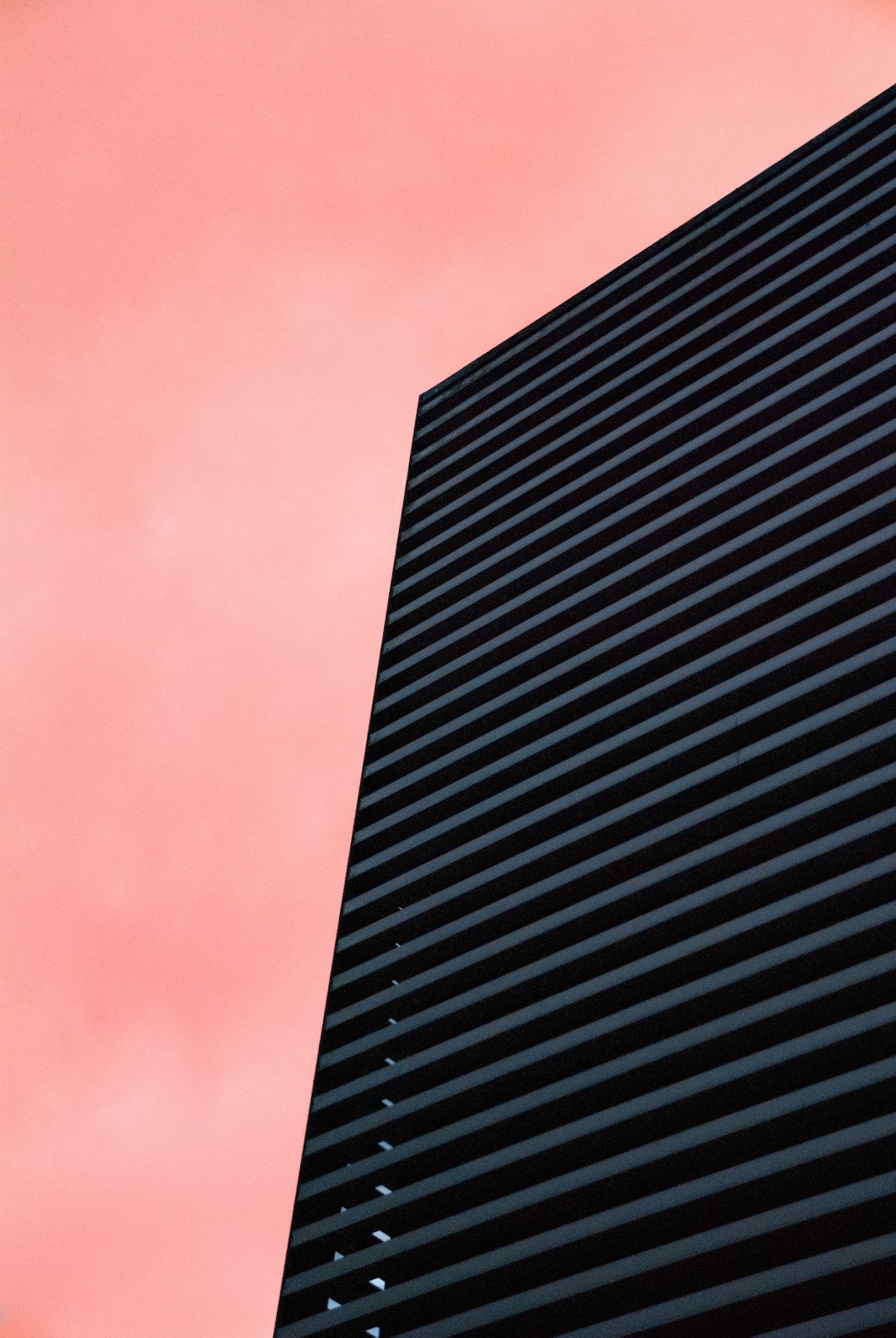 black high rise building under blue sky