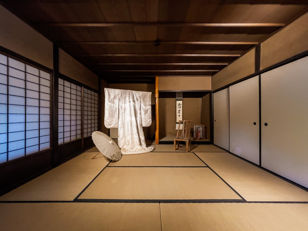 white textile hanging on brown wooden door