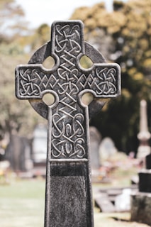 black celtic cross with cross on top
