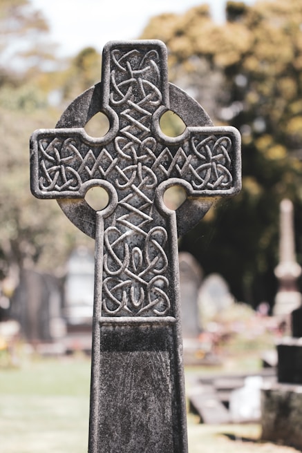 black celtic cross with cross on top