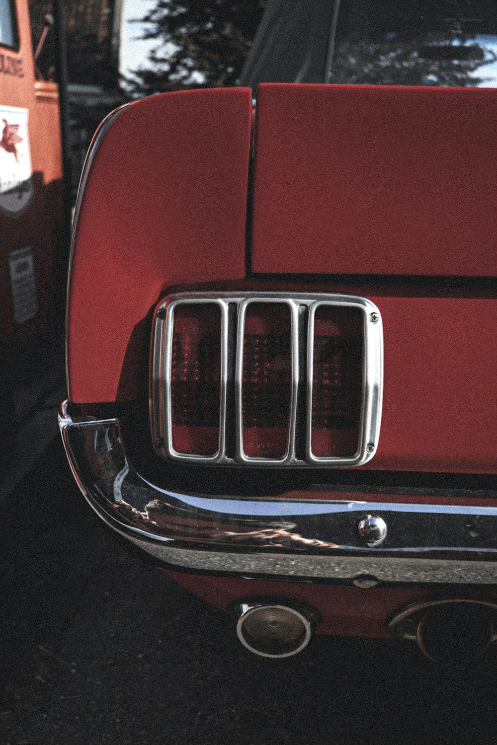 red and silver car with white and red license plate