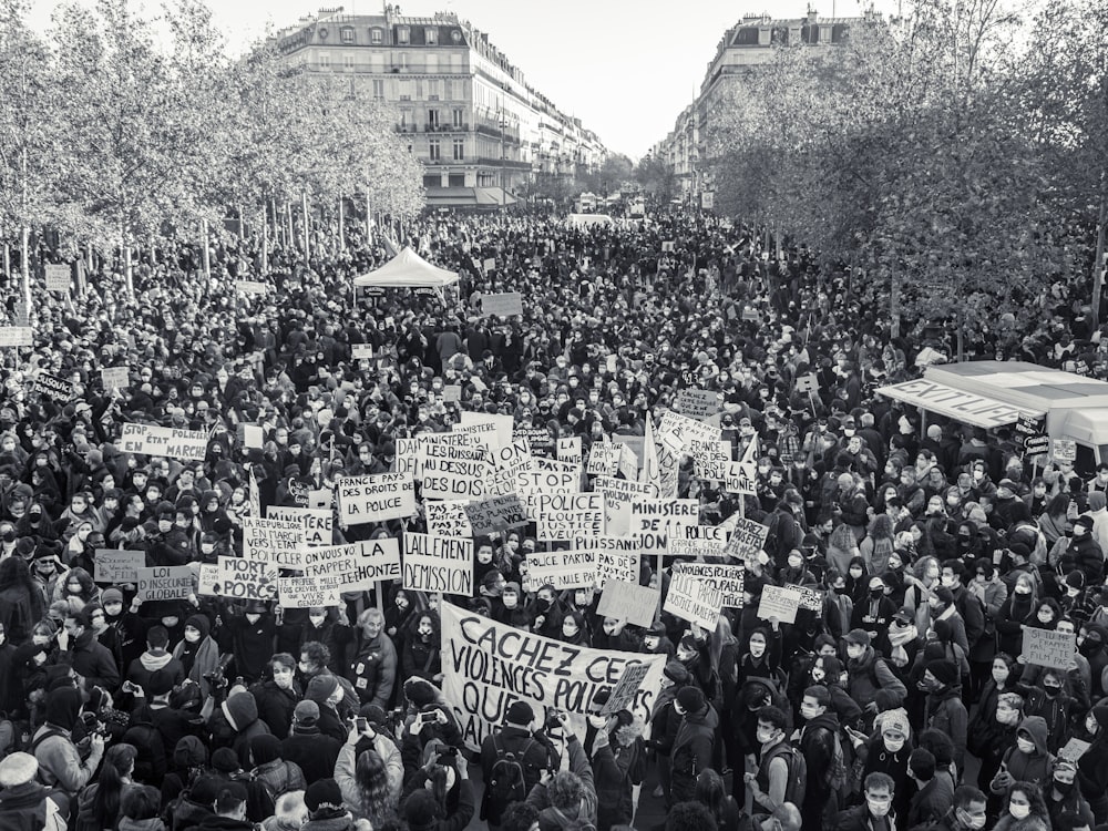 people standing on the street during daytime