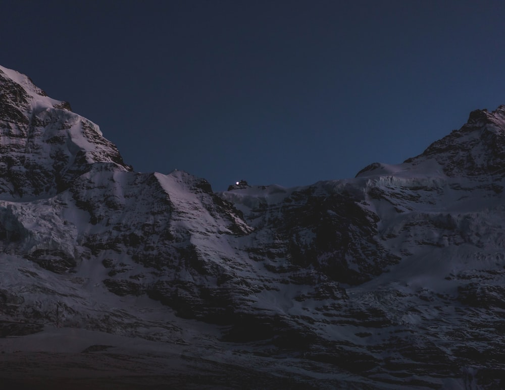 snow covered mountain during daytime