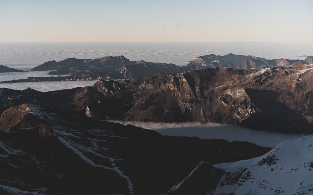 black and brown mountains under blue sky during daytime