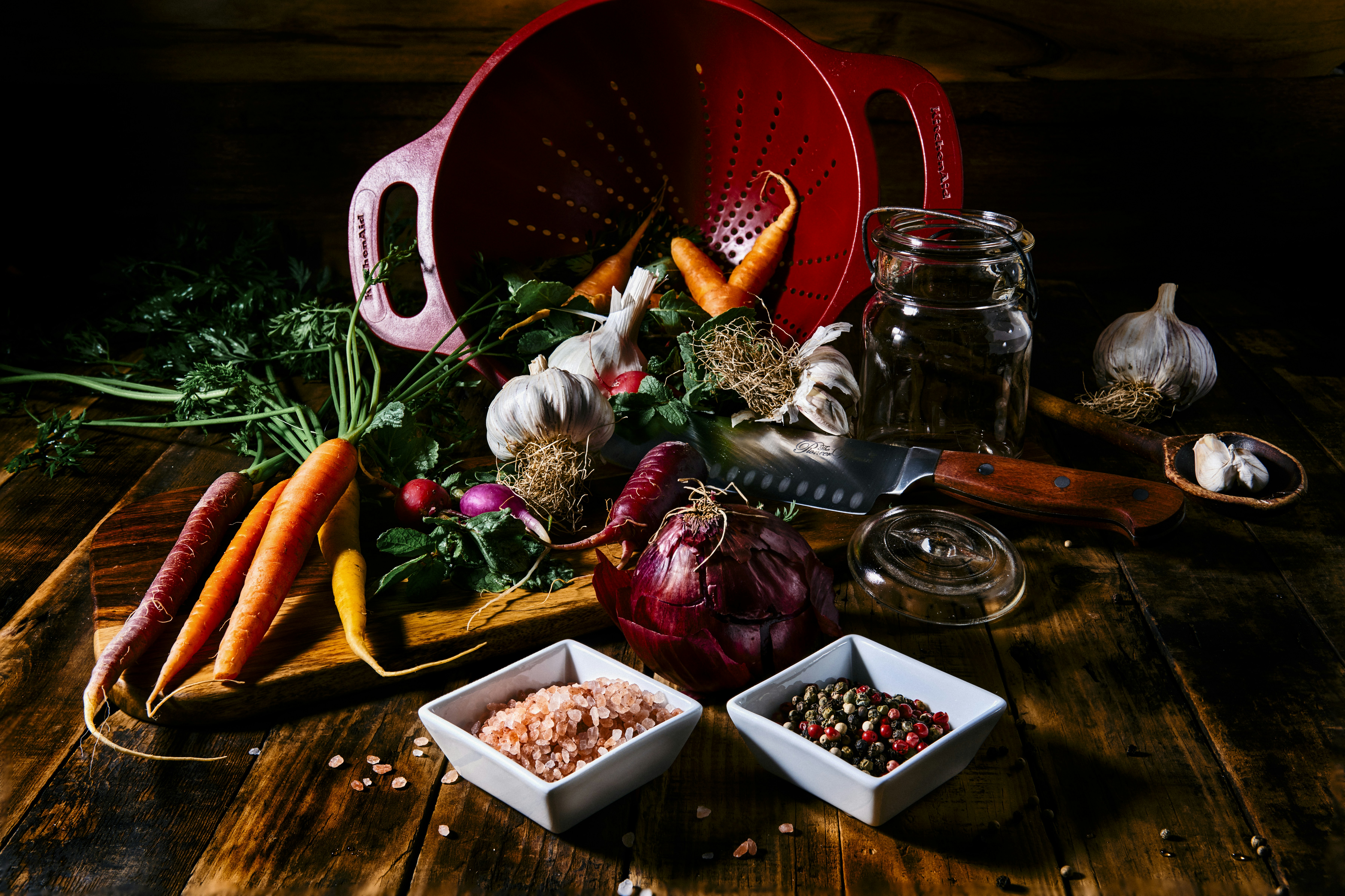 sliced fruits on red plastic basket