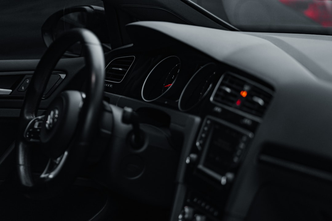 black and gray car steering wheel
