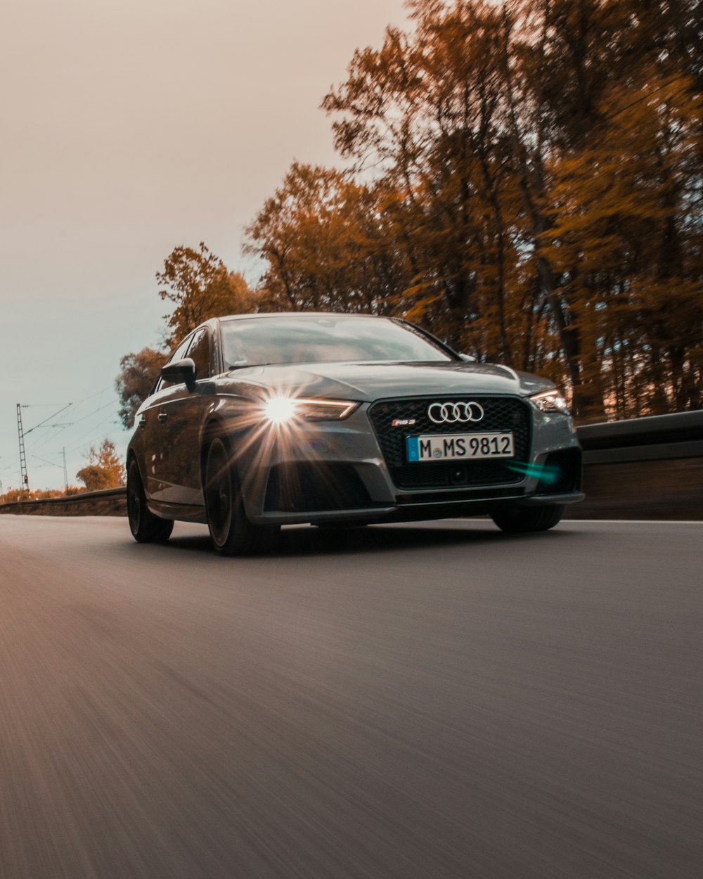 black audi a 4 on road during daytime