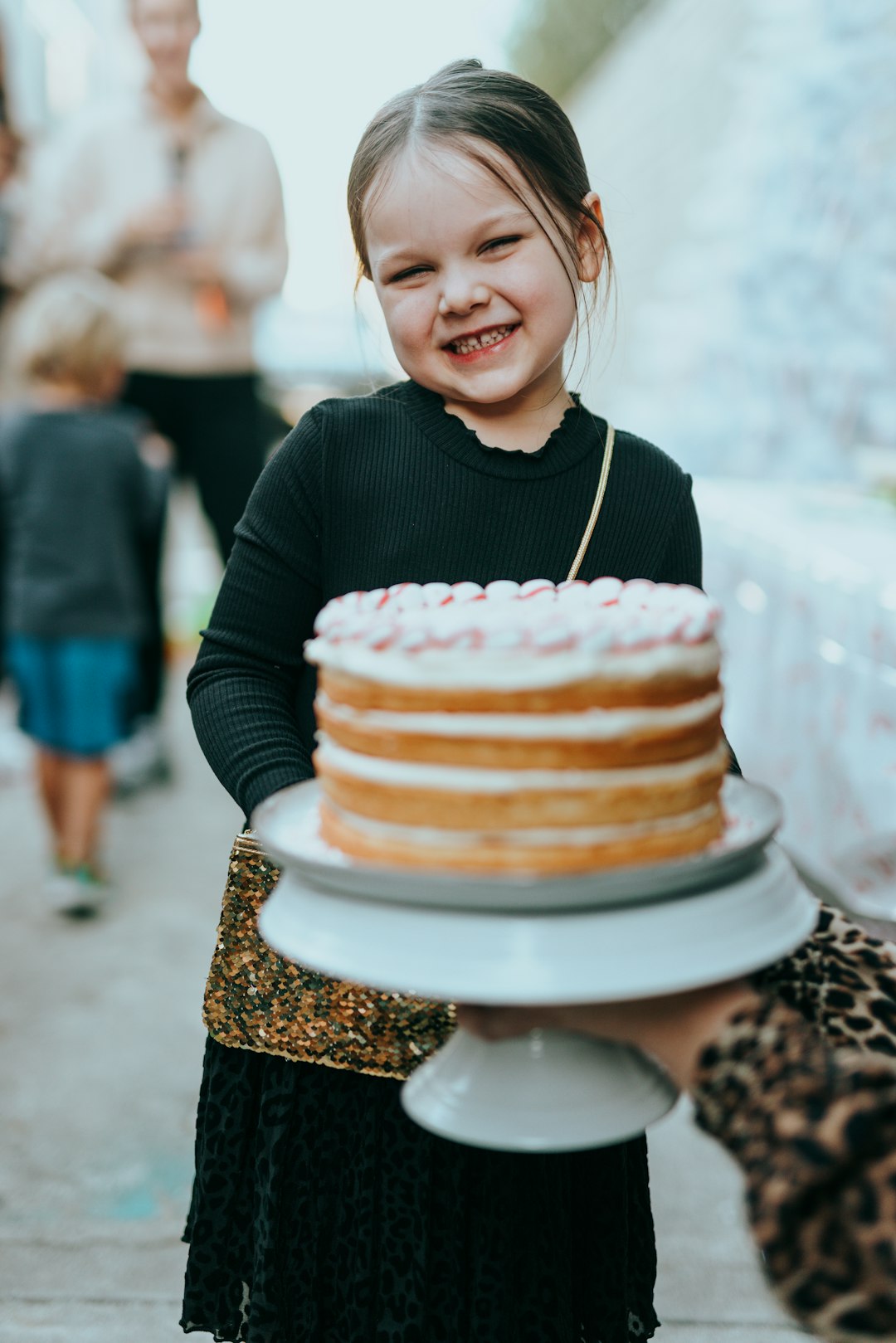 girl in black long sleeve shirt smiling