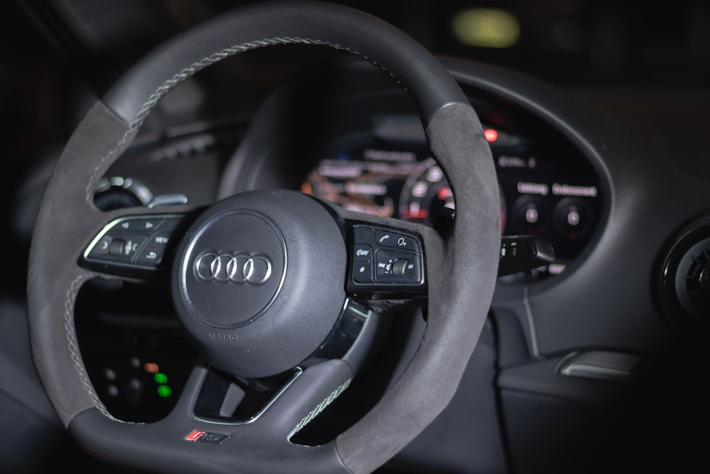 black audi car steering wheel