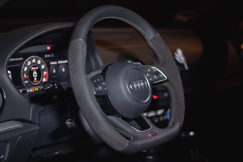 black audi car steering wheel