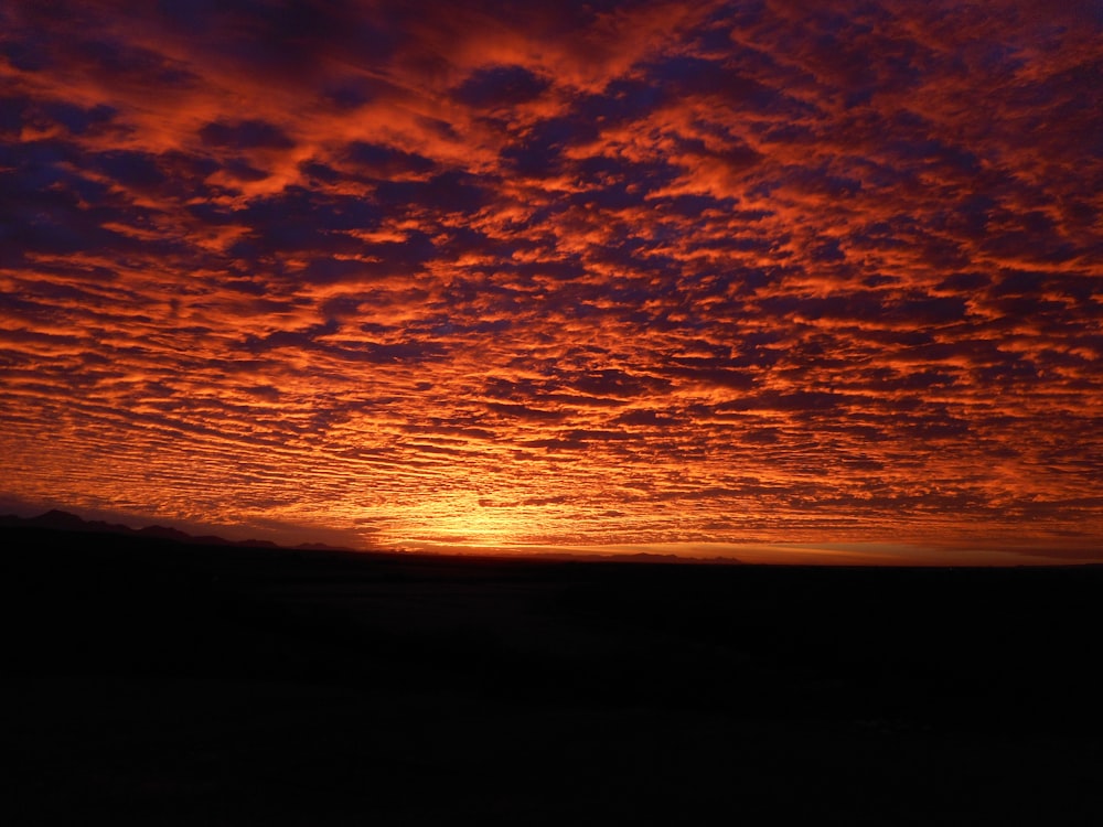 silhouette of mountain during sunset