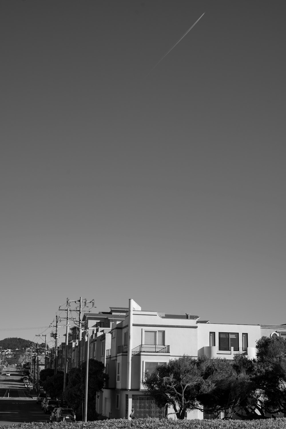 grayscale photo of houses during daytime