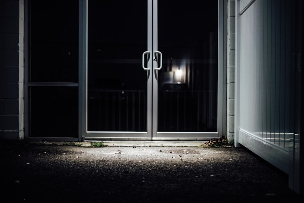 white wooden framed glass door