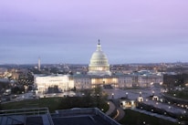 Cityscape of Washington, D.C. highlighting key landmarks at sunset.