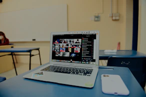 Modern virtual classroom with diverse students engaging online, symbolizing inclusive education.