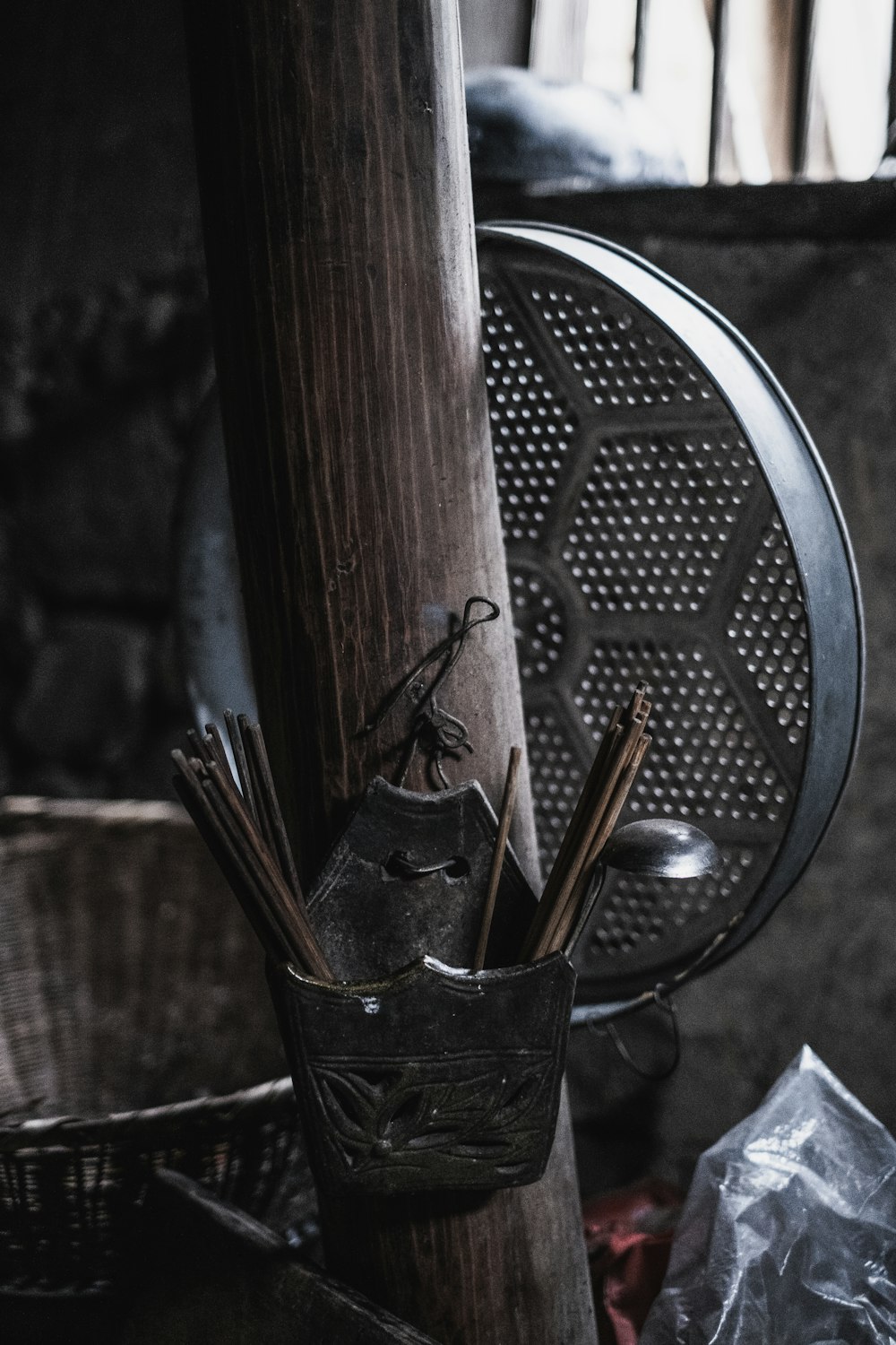 silver fork and bread knife on black round plate