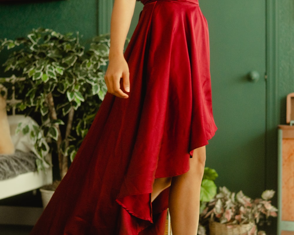 woman in red sleeveless dress