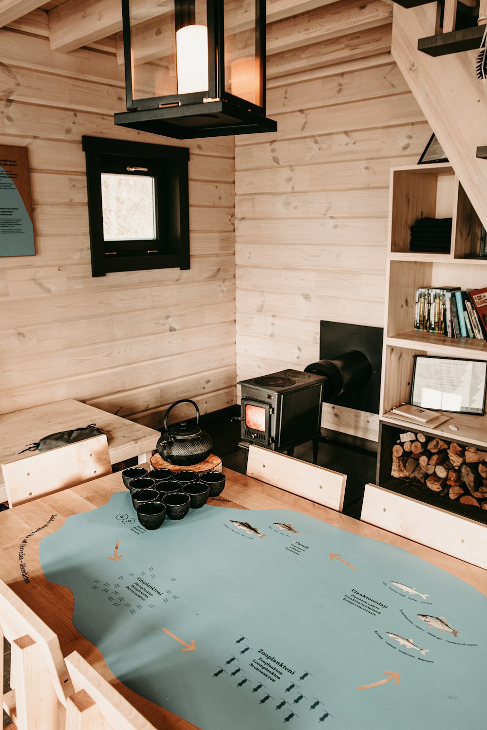 black flat screen tv on brown wooden tv rack