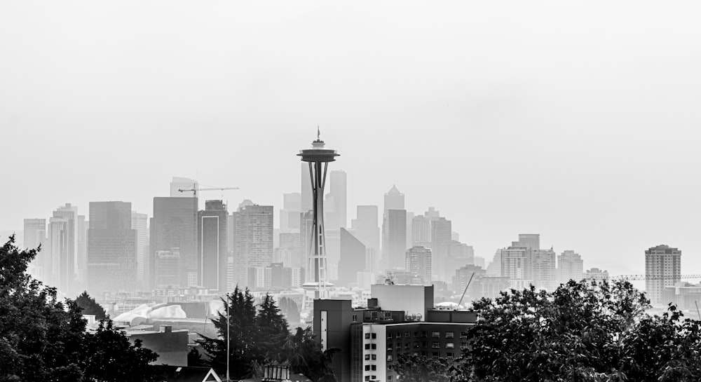 grayscale photo of city skyline during daytime