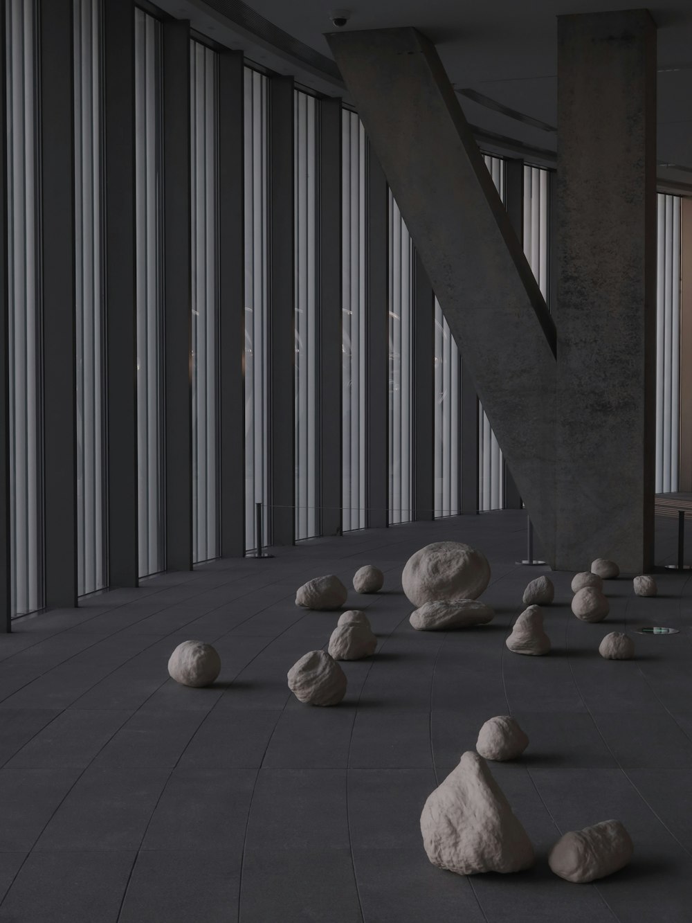 brown wooden pathway with stones on the floor