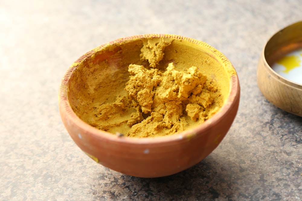 brown powder in brown ceramic bowl