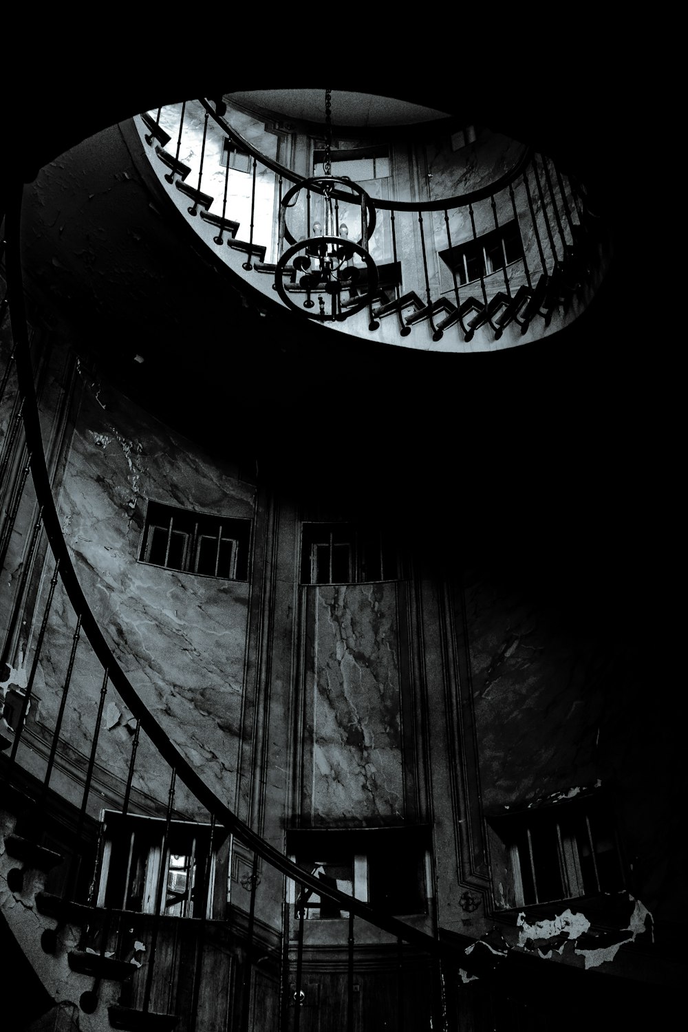 black spiral staircase with black metal railings