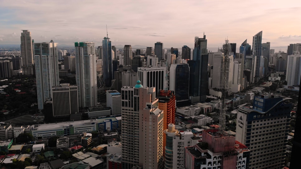 aerial view of city buildings in Makati City during daytime.