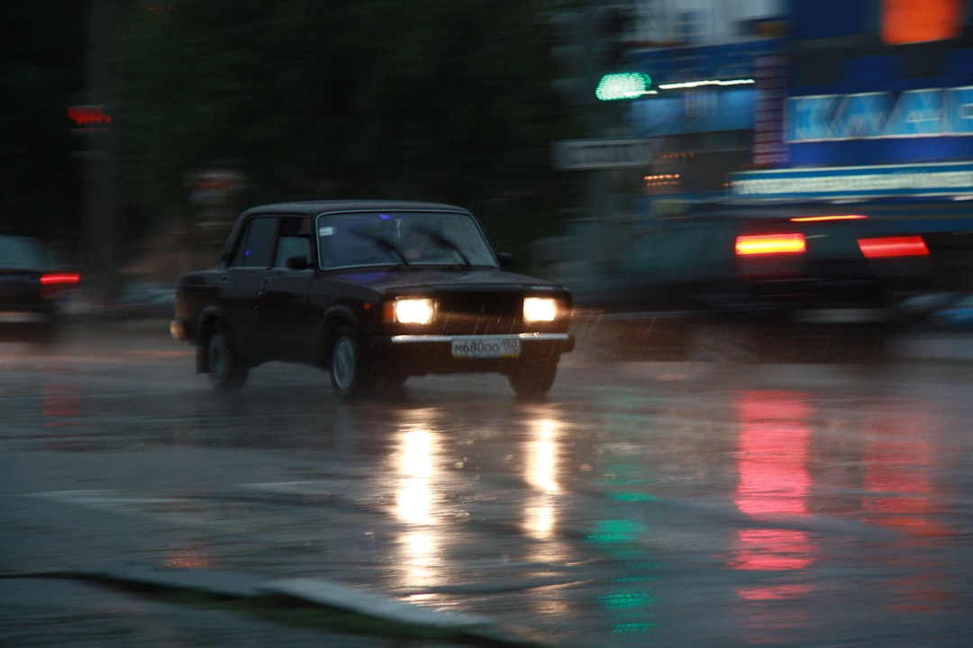 black suv on road during night time