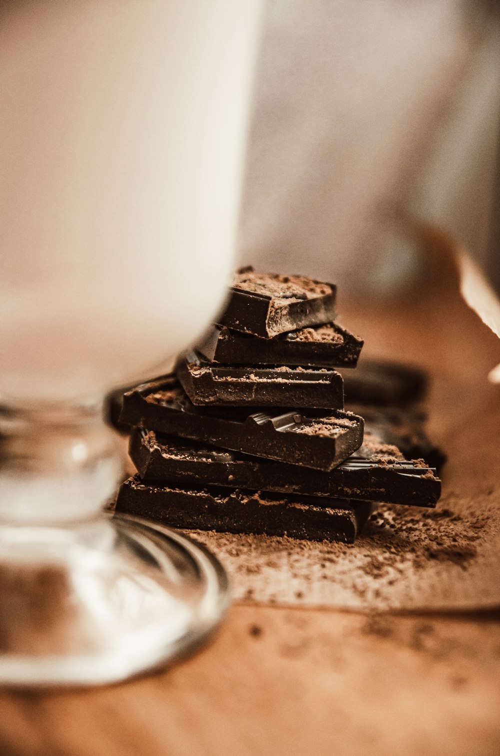 black chocolate bar on brown wooden table