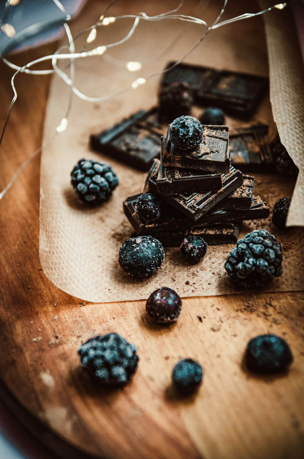 black berries on white paper