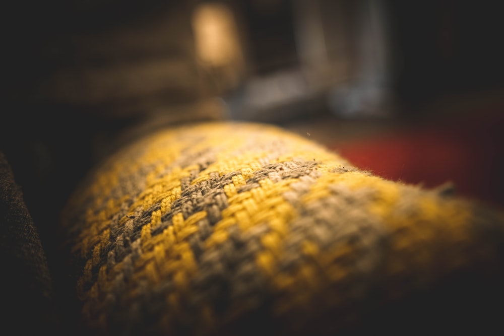 yellow and black knit textile