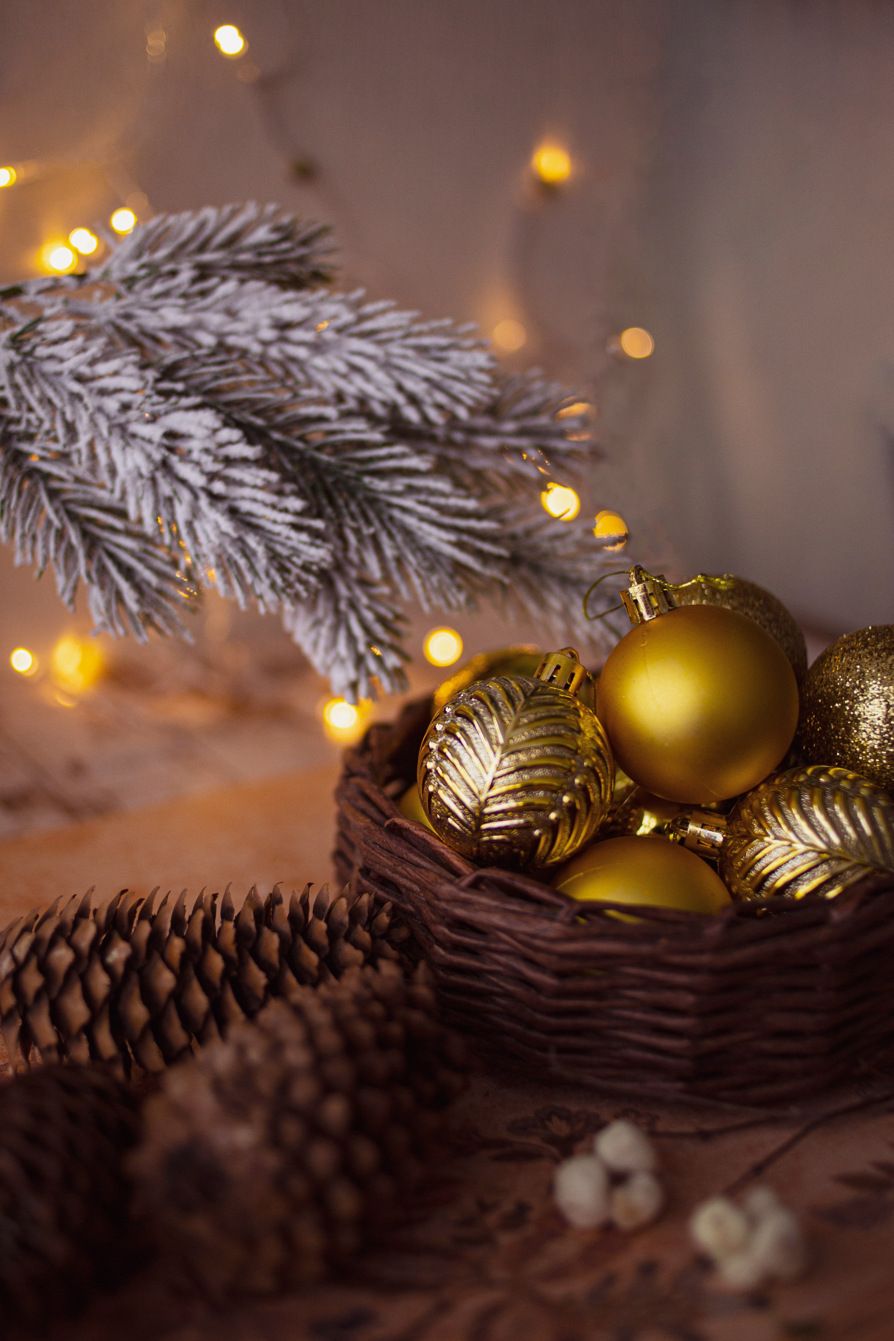 gold baubles on brown woven basket