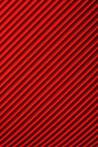 red and black striped textile