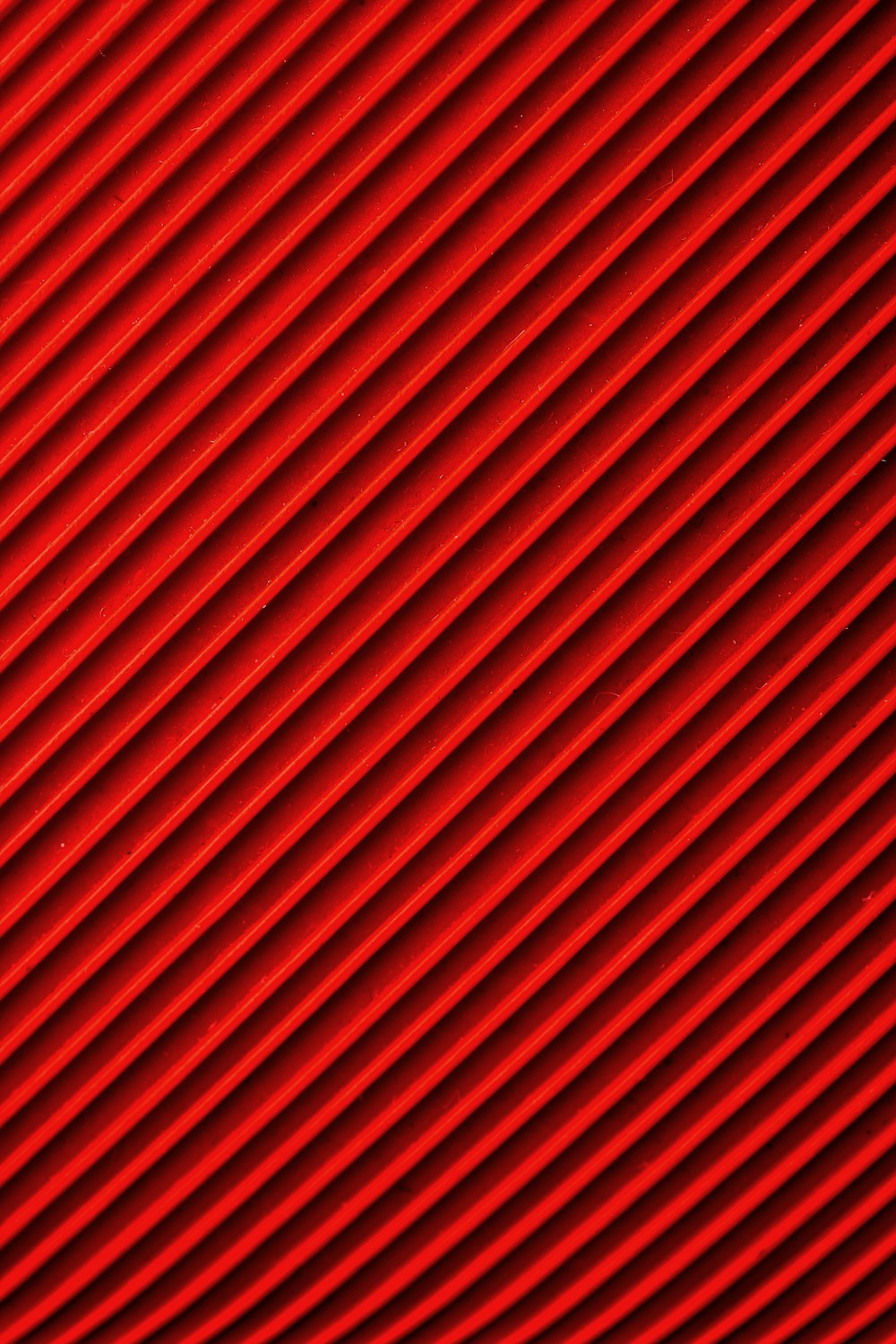 red and black striped textile