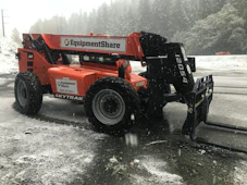 Orange forklift construction vehicle