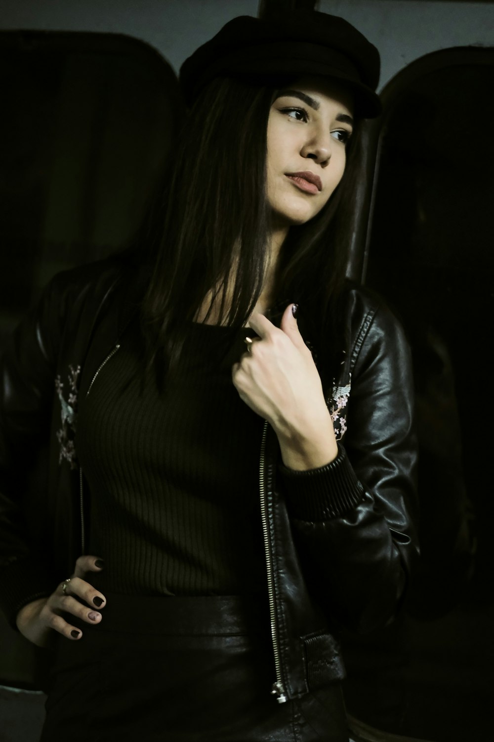 woman in black leather jacket