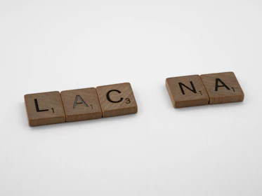 Close-up of colored letter tiles indicating correct and misplaced letters in Canuckle.