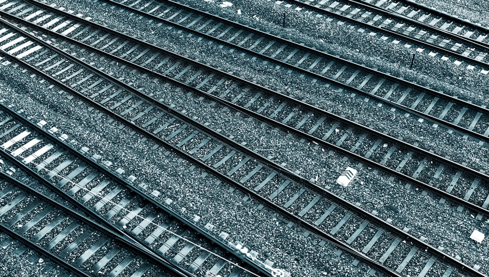 black metal train rail tracks