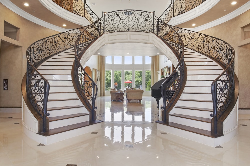 white wooden chairs on white floor tiles