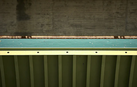 Close-up photo of a durable bearing pad installed on a bridge support.