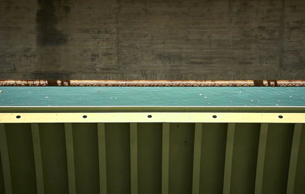 High-resolution photo of a modern concrete structure highlighting hybrid reinforcement details.