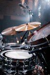 brown and white drum set