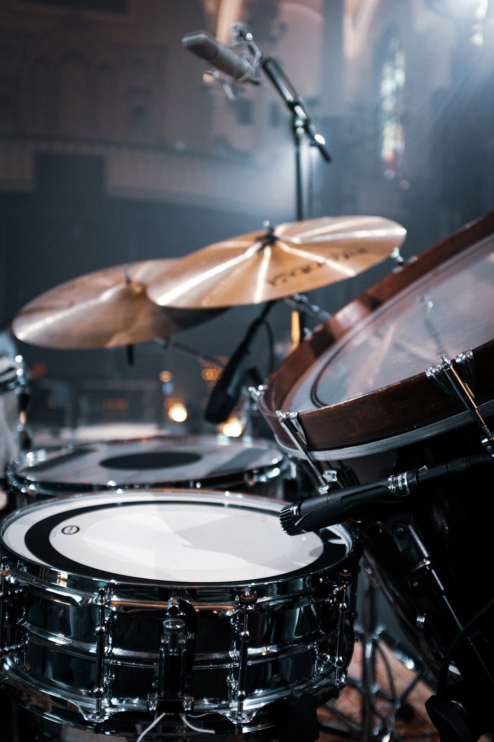 brown and white drum set