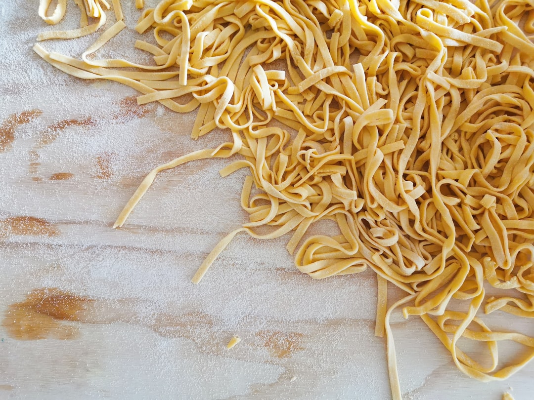 white and brown textile on white textile,