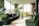 A clean, bright living room with freshly cleaned carpets.
