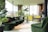 A clean, bright living room with freshly cleaned carpets.