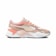 A stylish athletic shoe with a modern design, featuring a mix of suede and mesh materials. The color palette includes soft pink, beige, and white tones. The sole is slightly chunky, providing a trendy and comfortable look.