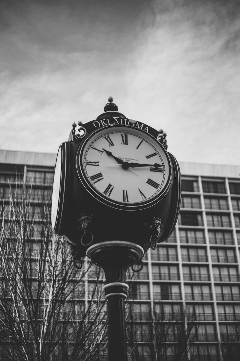 grayscale photo of analog clock