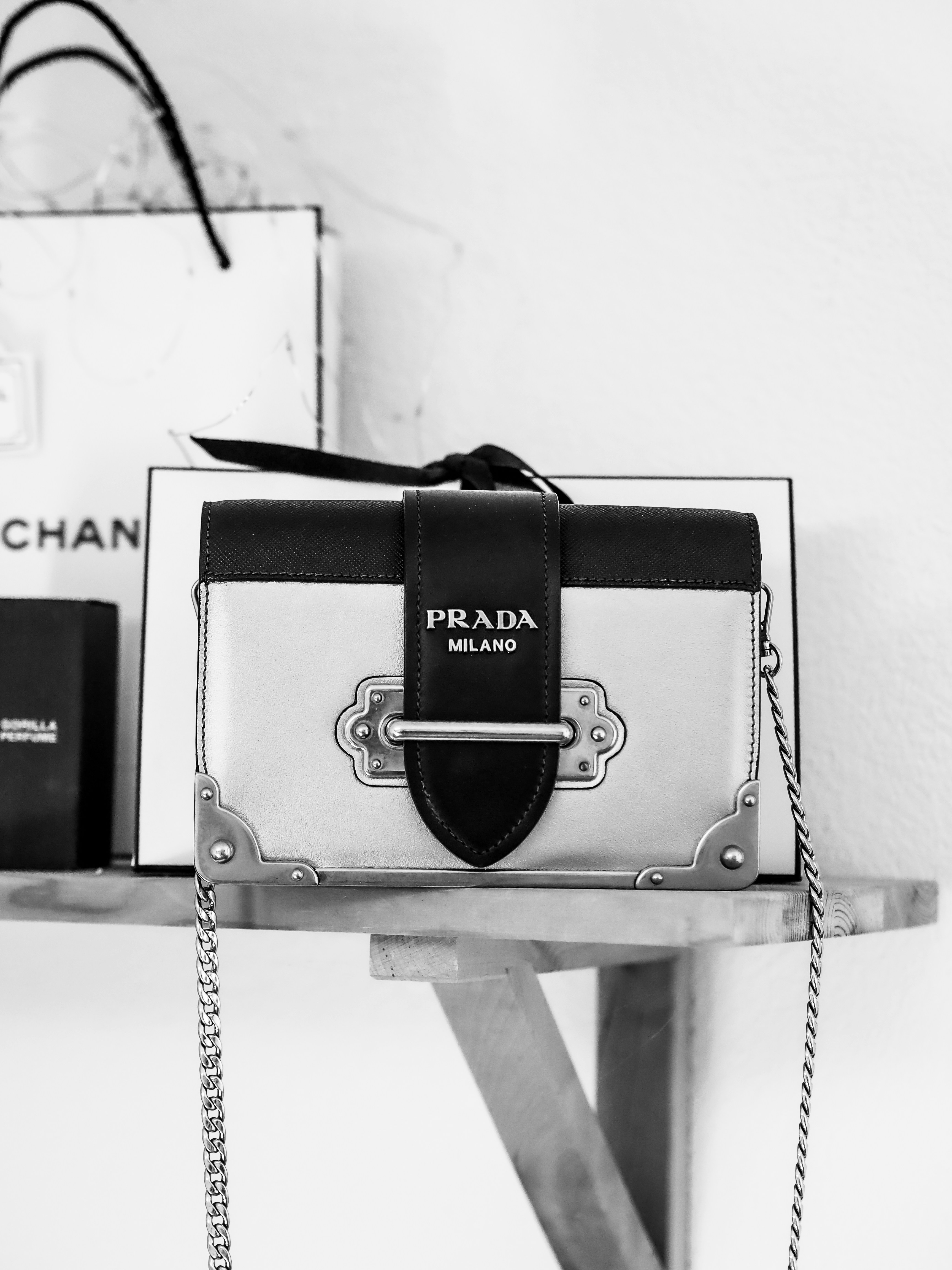 black and white box on white wooden table