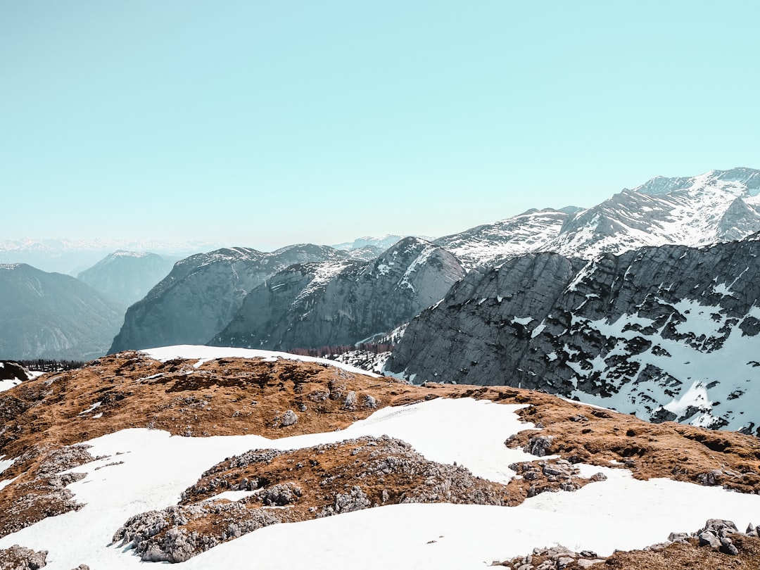 snow covered mountain during daytime